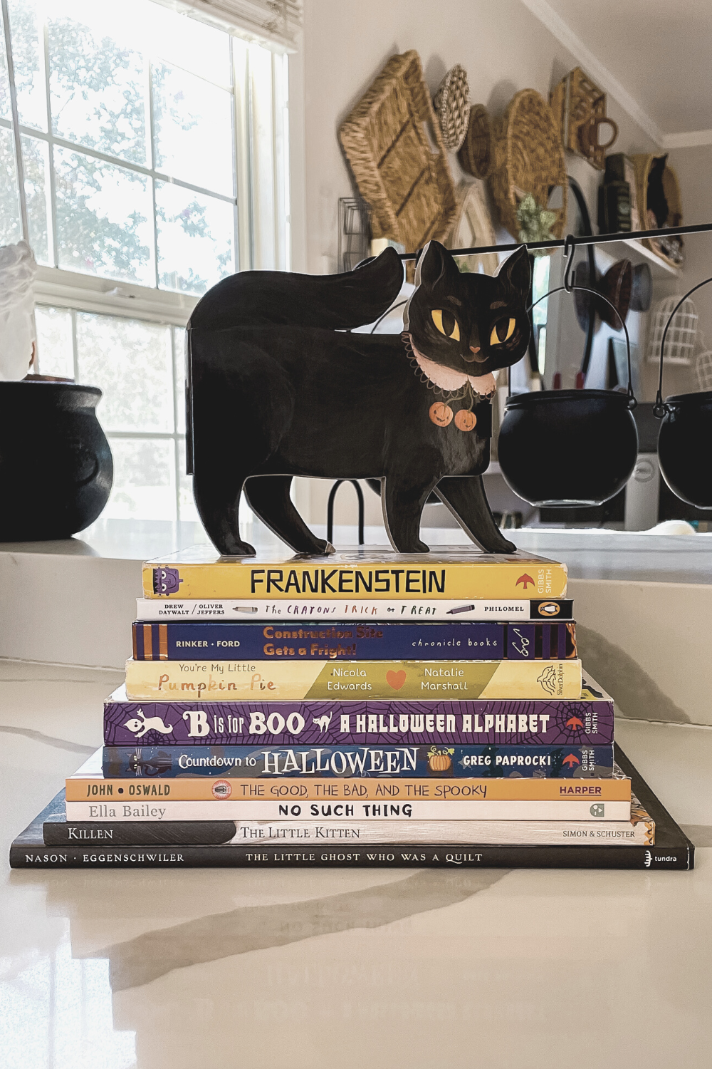 A stack of the best kids books for Halloween